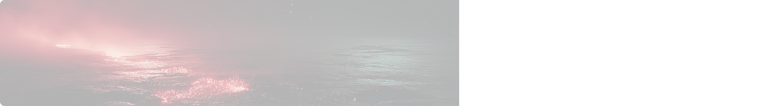 Dark ocean water illuminated by glowing red light reflections, creating a mysterious ambiance.
