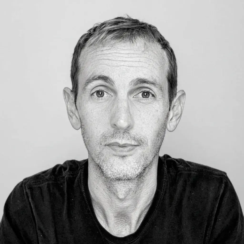 A black and white photo of a man