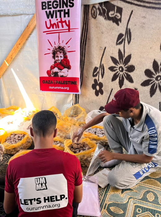 Umma Relief volunteers preparing sweets for distribution during Aid, bringing joy to children and families in refugee camps.