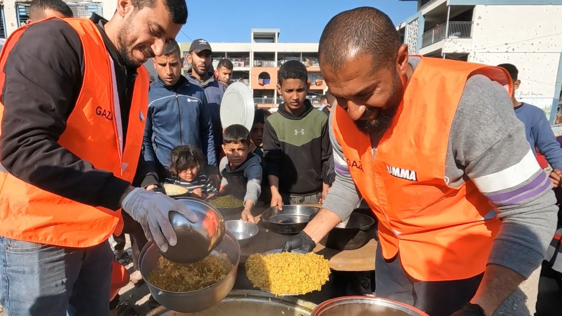 UMMA volunteers serving food in Gaza