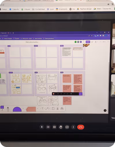 Screen showing a digital whiteboard with sketches, notes, and diagrams in a video call interface.