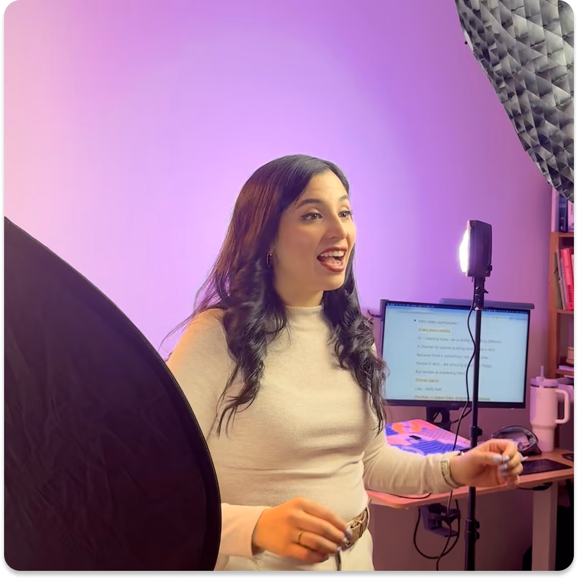 Video call screen showing four diverse professionals smiling and engaging, each in their own home or office backgrounds.