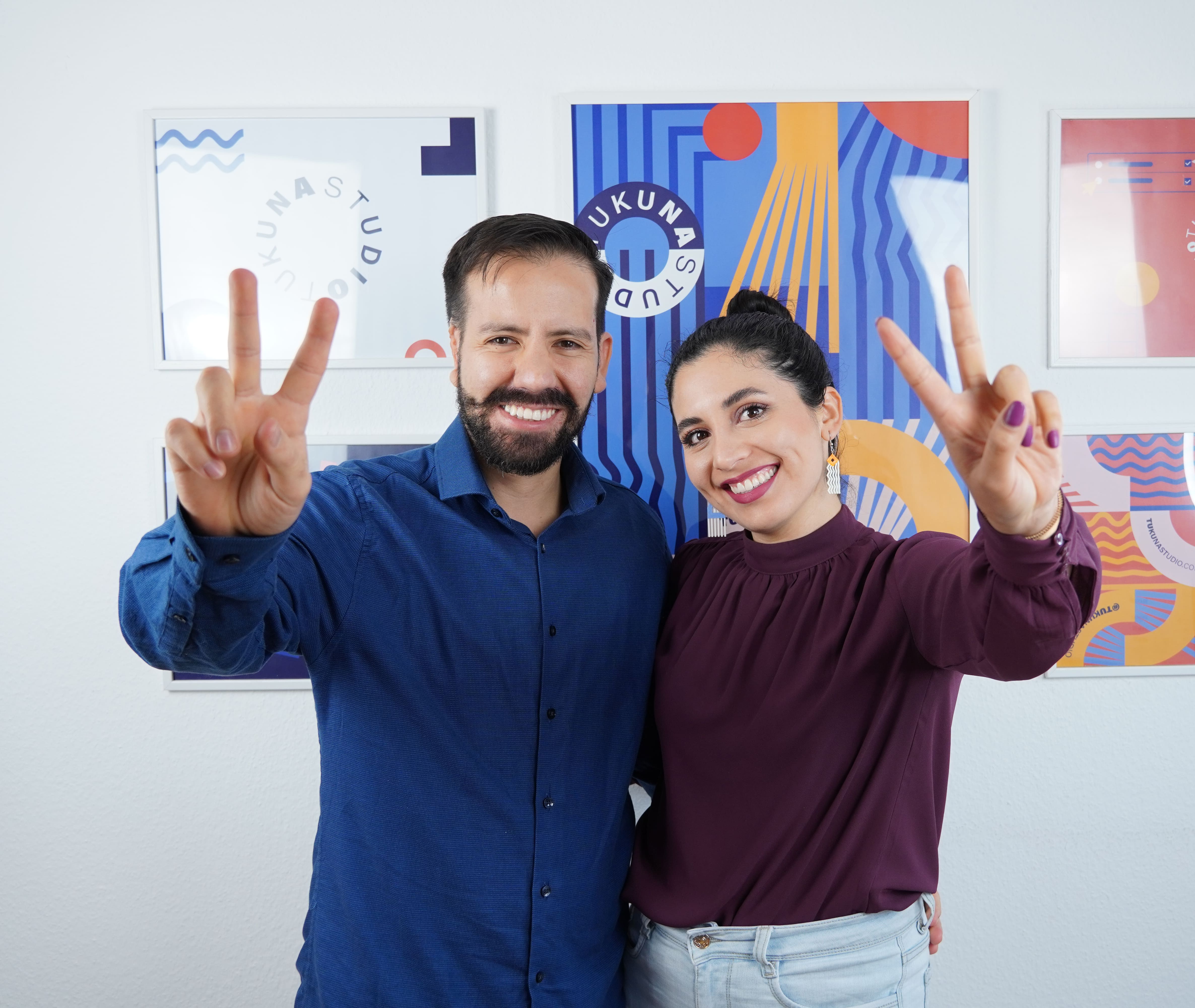 Video call screen showing four diverse professionals smiling and engaging, each in their own home or office backgrounds.