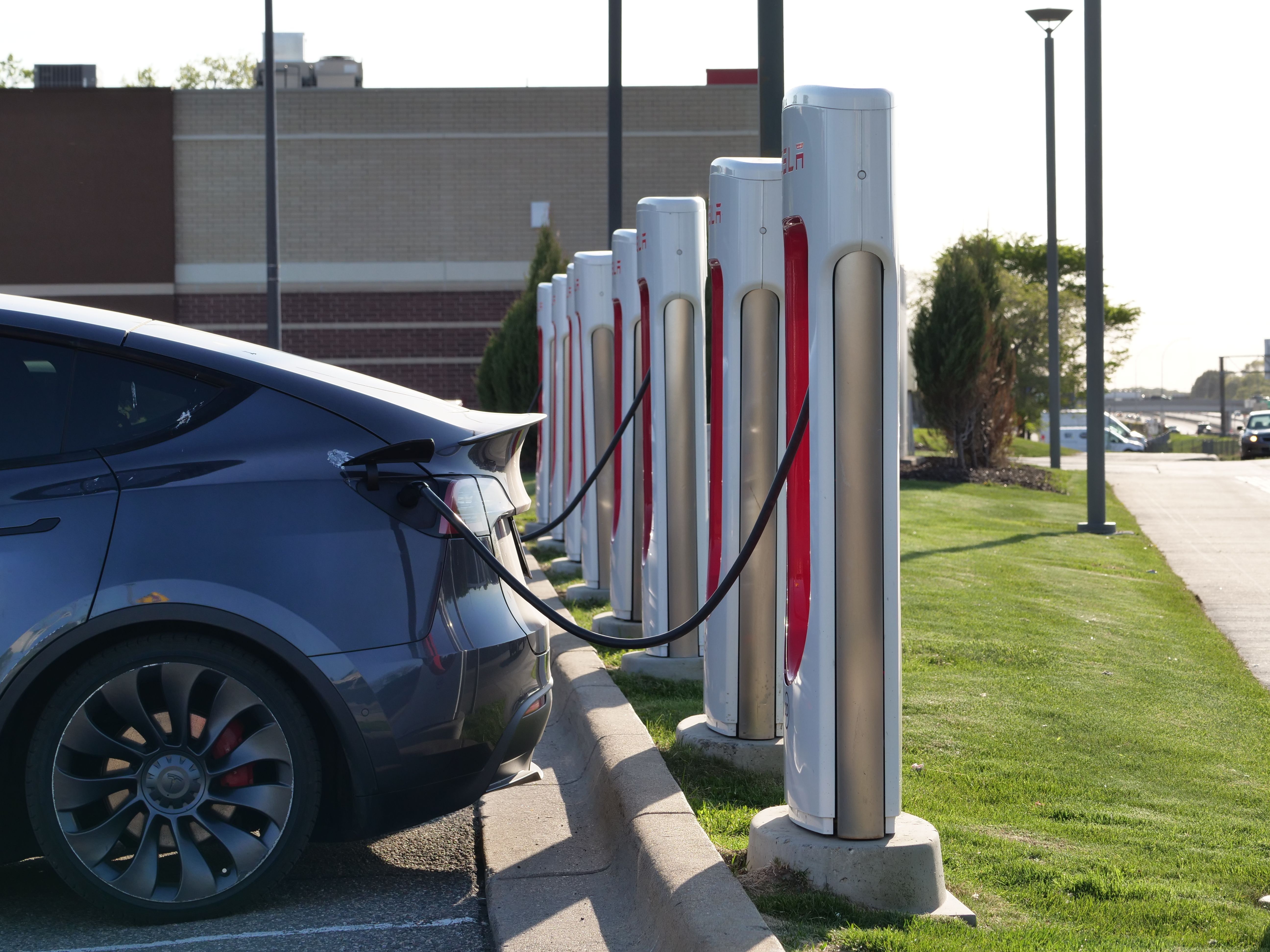 electric SUV at a charger