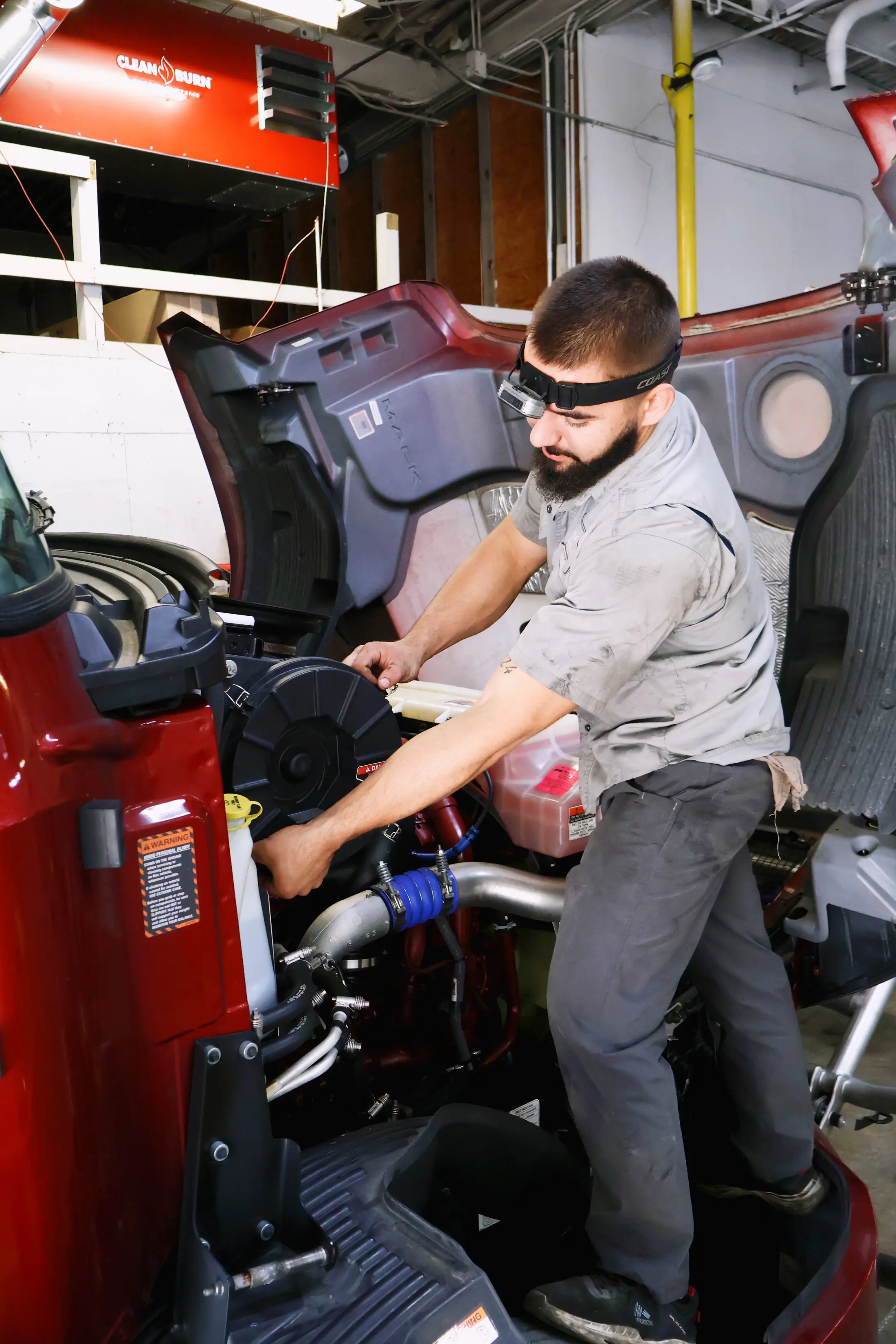 Mechanic performing truck repair in Richmond, VA