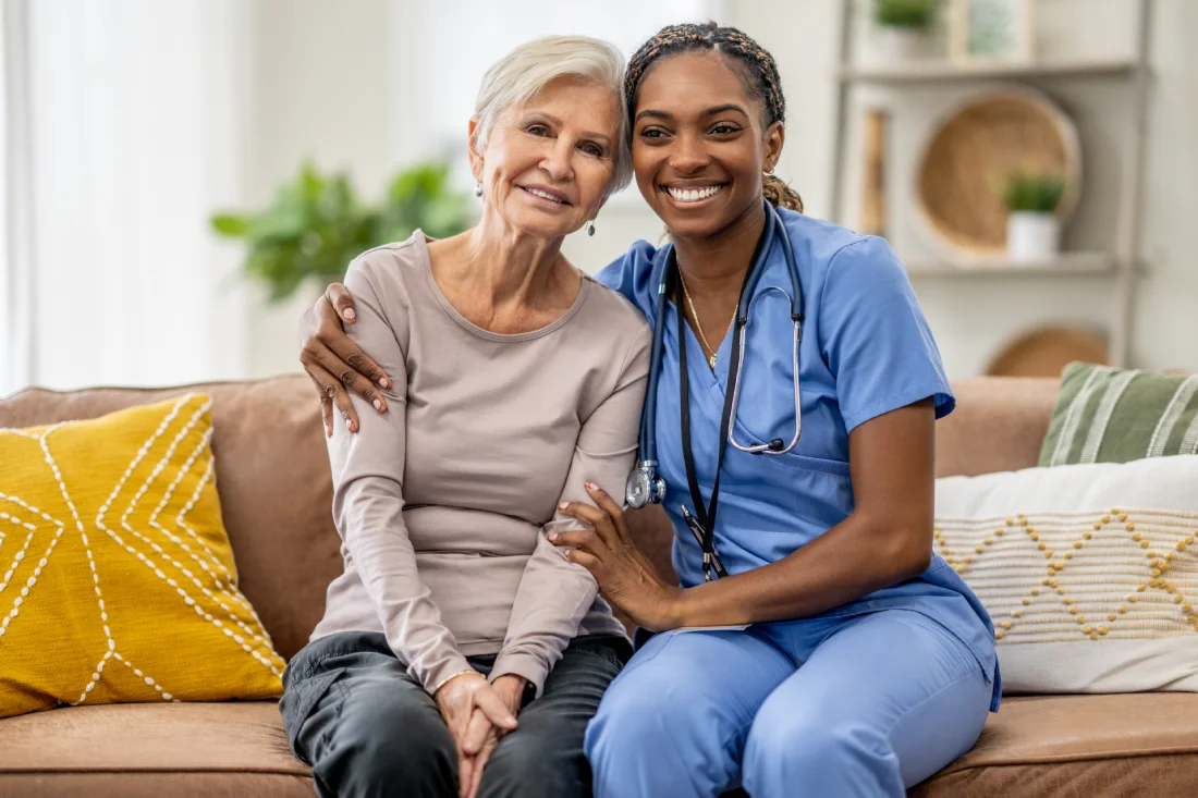 Healthcare provider delivering compassionate patient care in private home setting