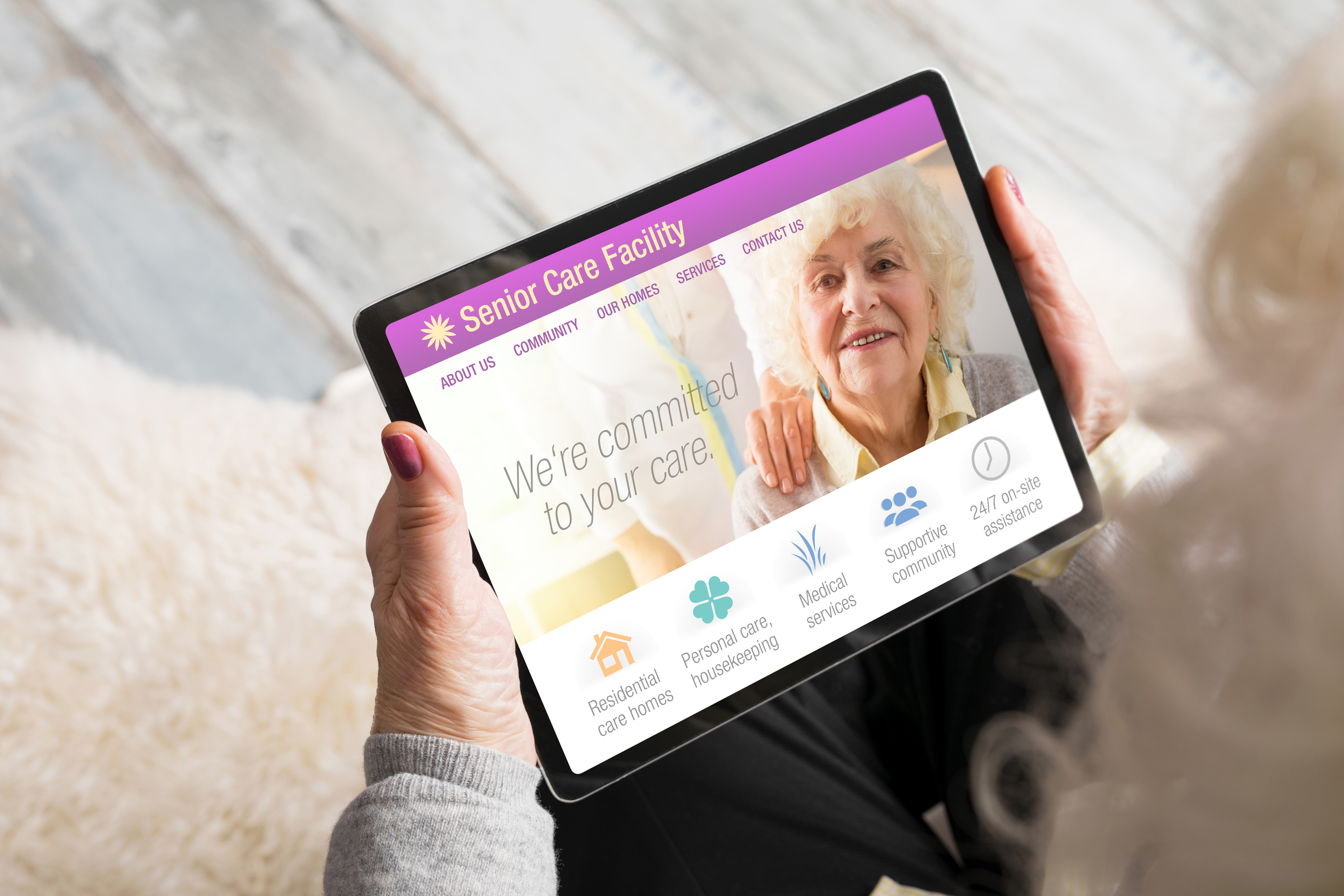 Senior woman using tablet for searching information about assisted living facilities