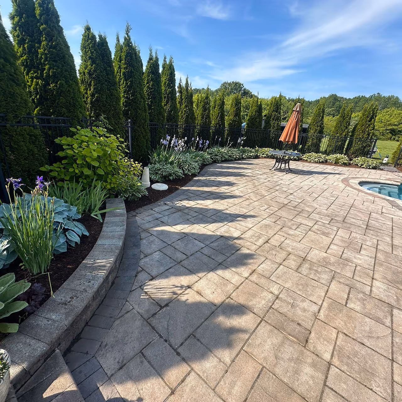 High end hardscaping project with retaining walls and walkways in Connecticut