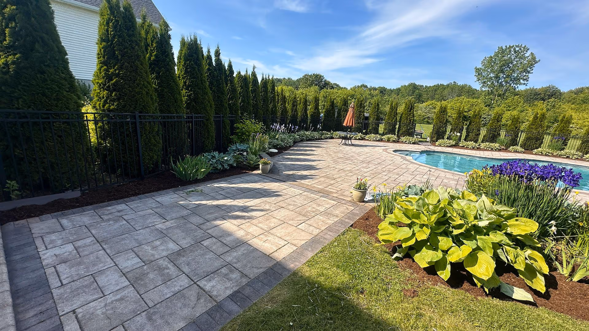 Custom paver patio installation by Briarwood Lawn and Landscape in Suffield, CT