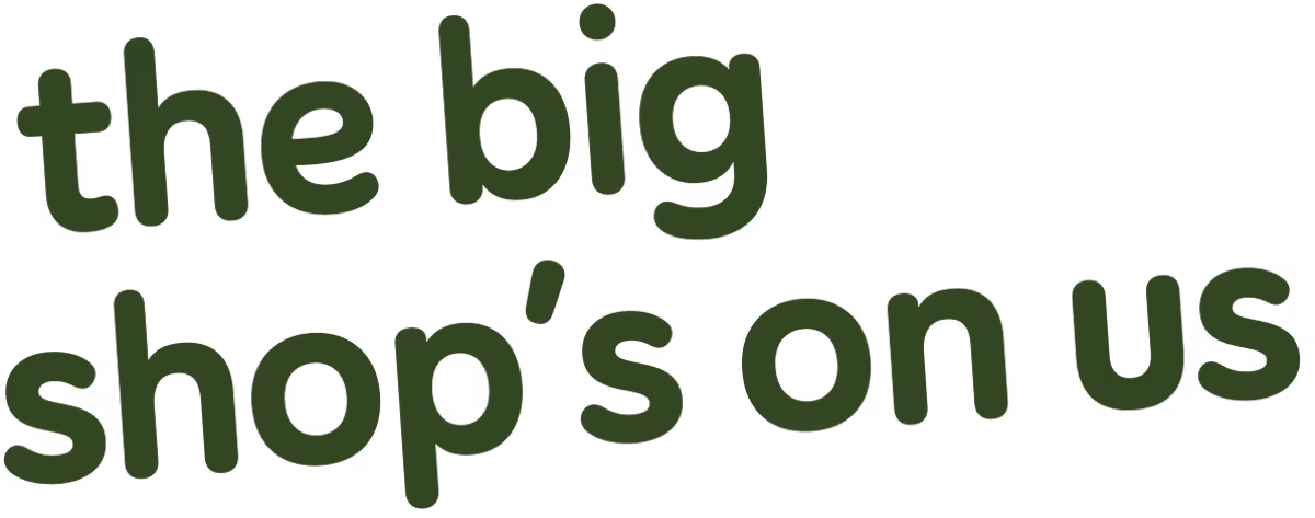 Text saying 'the big shop’s on us' in green lowercase letters with a slight tilt.