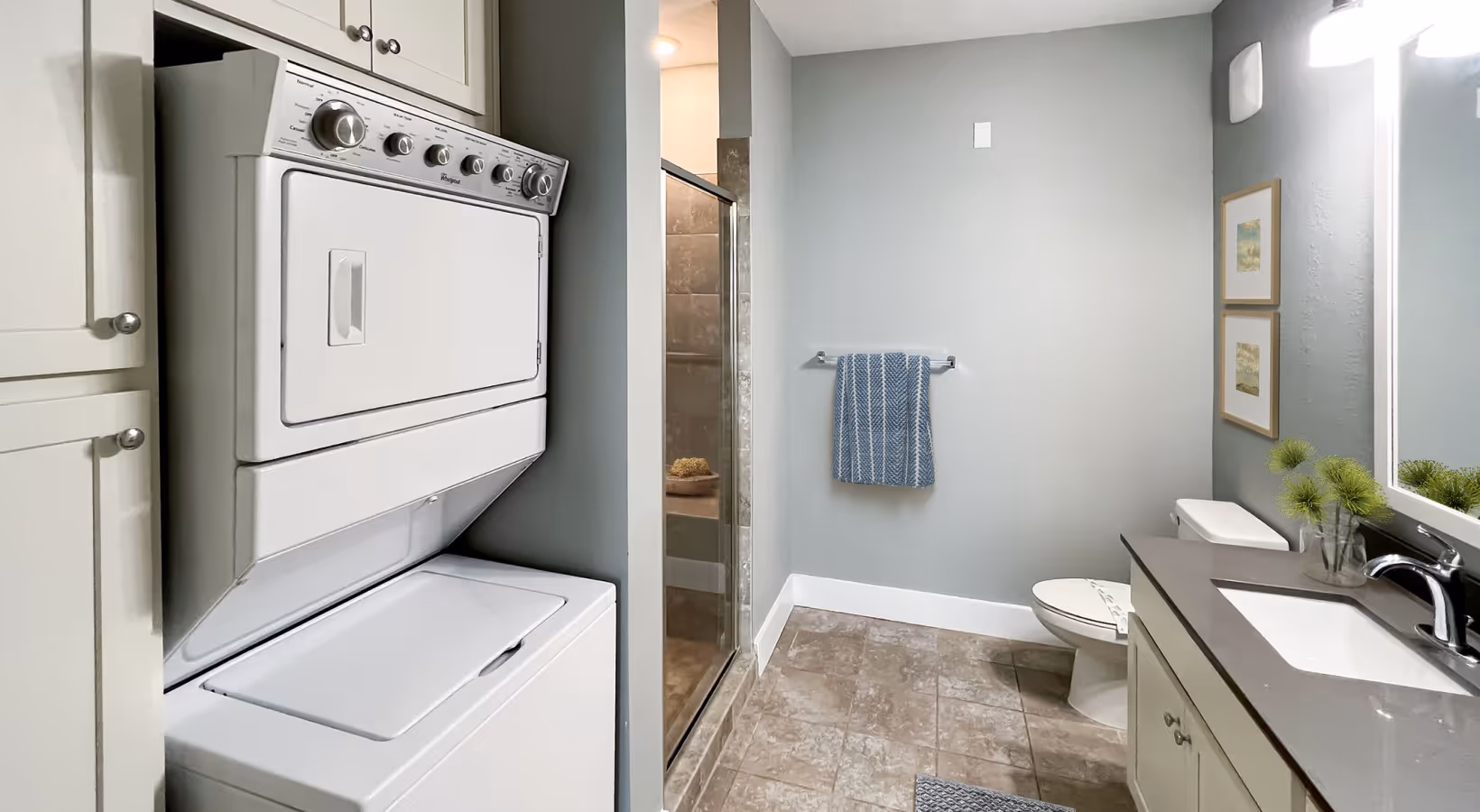 Studio apartment bathroom with washer and dryer at Novus Westshore (S1 floor plan)