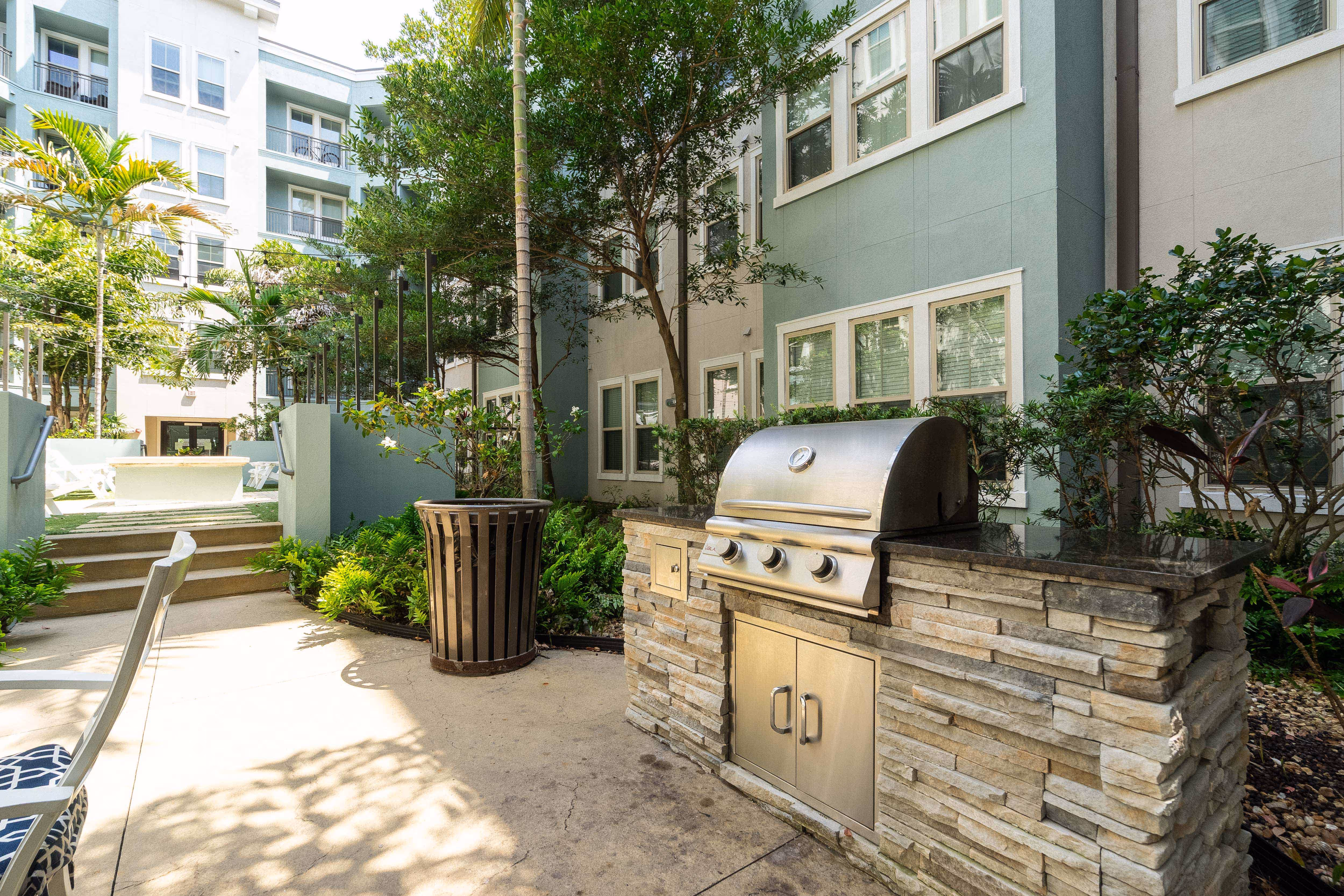 Zen courtyard with table at Novus Westshore