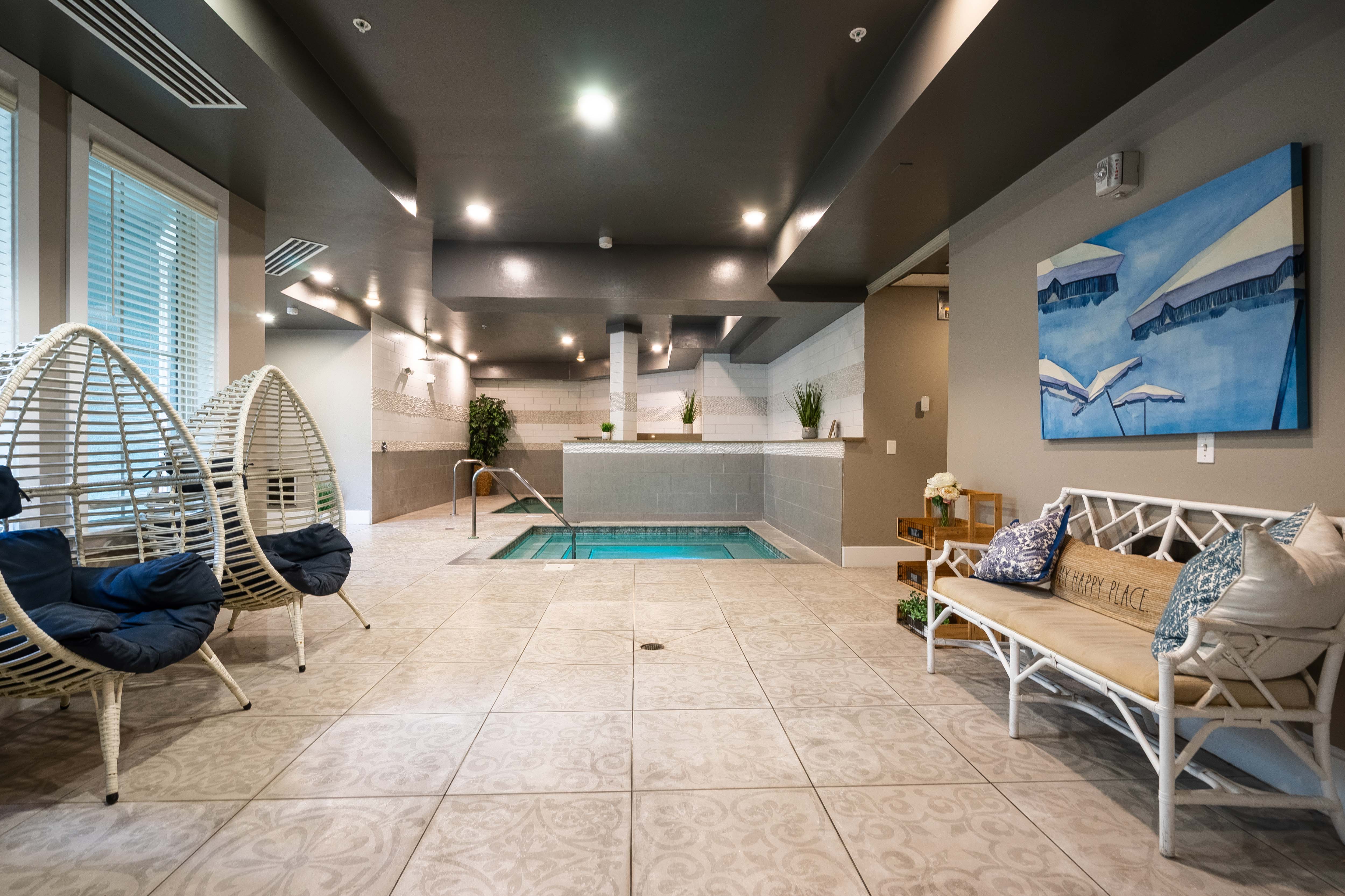 Wellness spa with sauna, and indoor hot tub at Novus Westshore