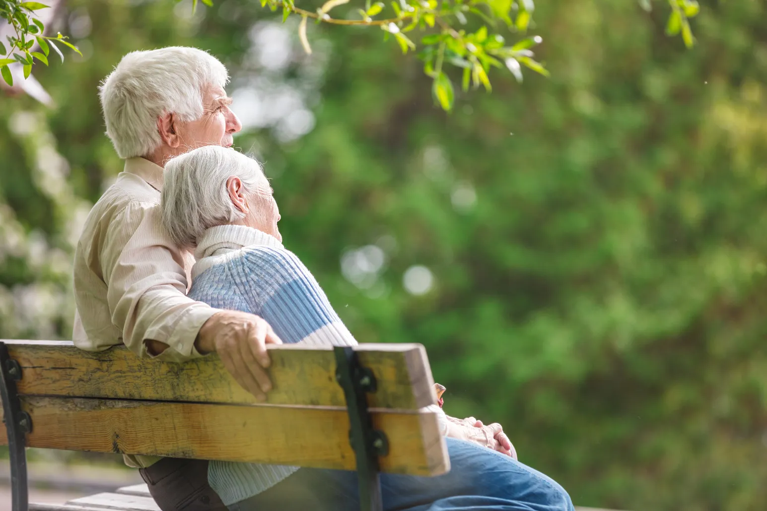 couple sitting on picnic bench