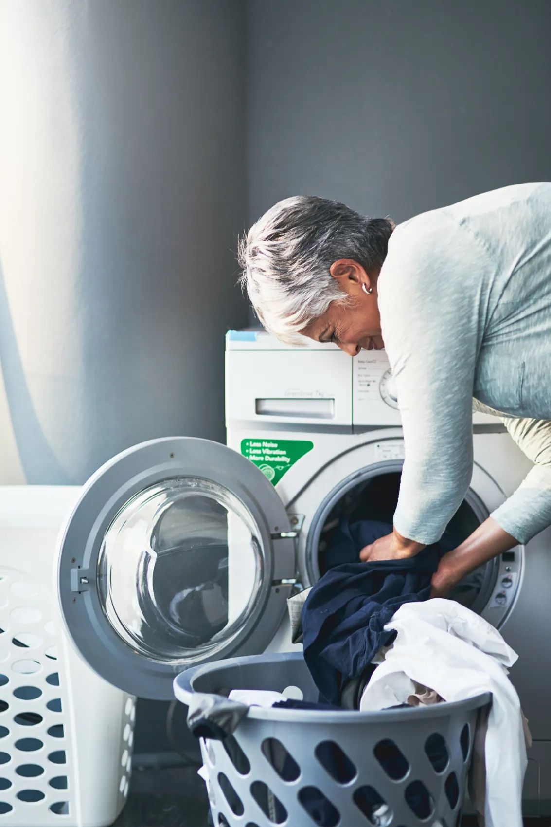 woman doing laundry stock image
