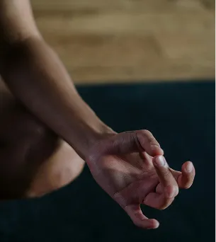 Close-up of hand holding yoga block