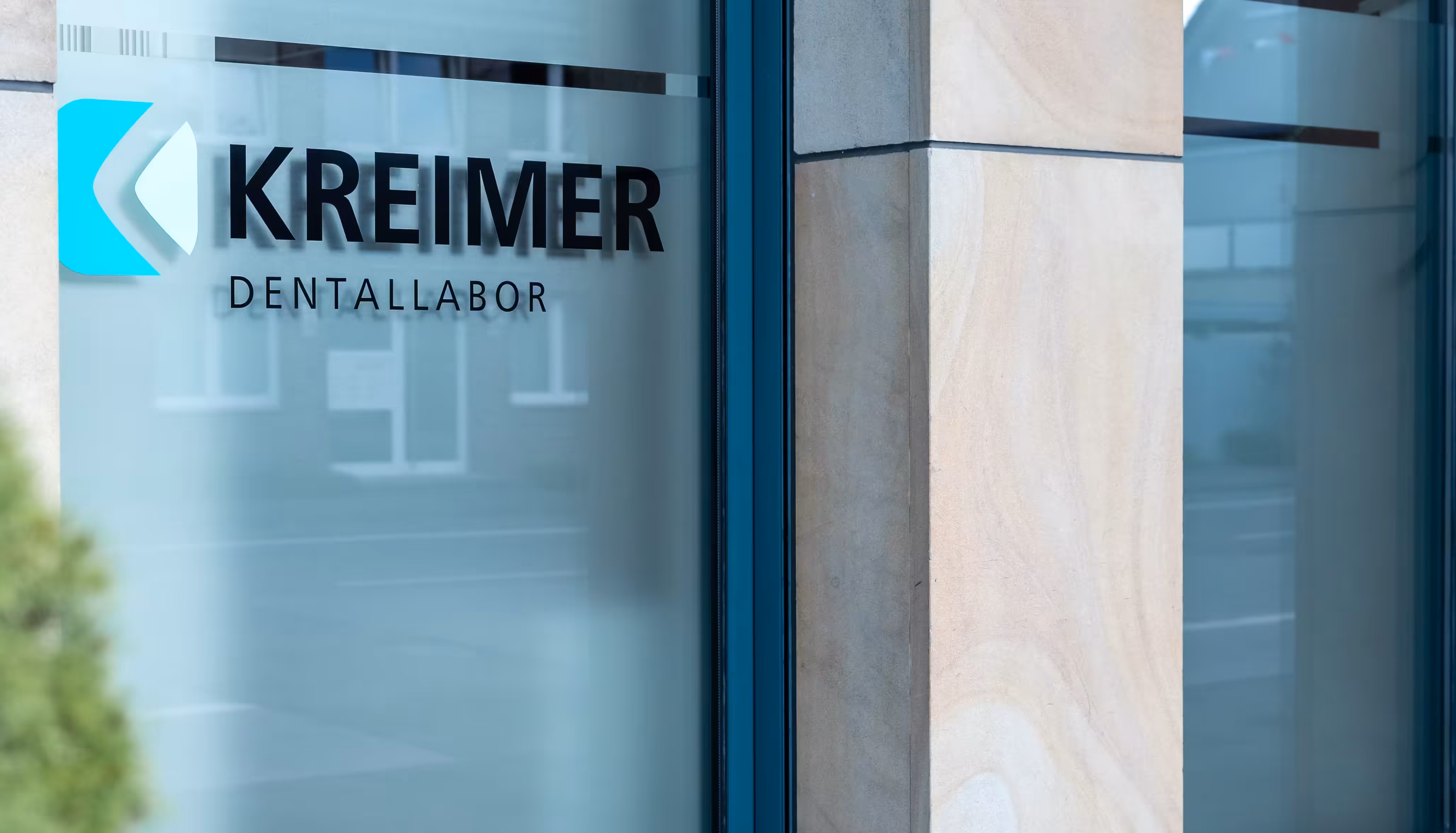 kreimer dentallbor logo