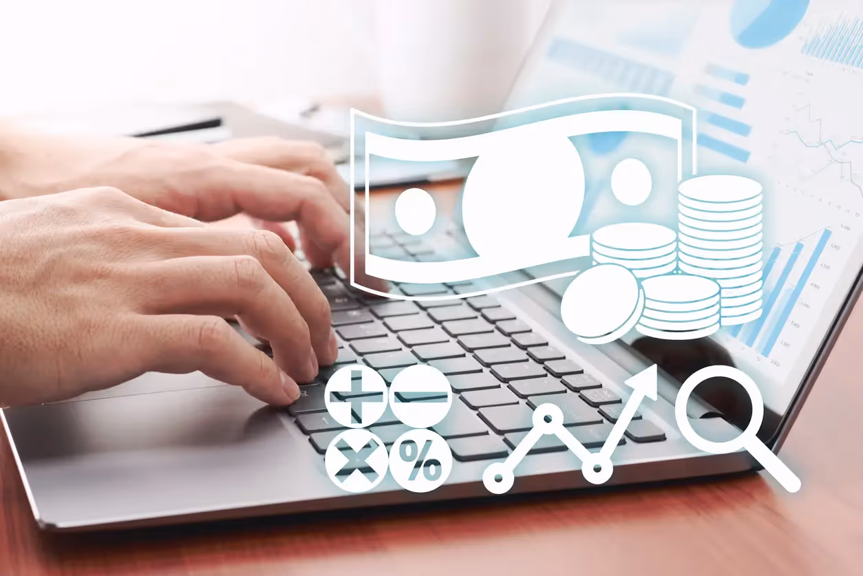 Close-up of hands typing on a laptop overlaid with white financial icons of cash and coins