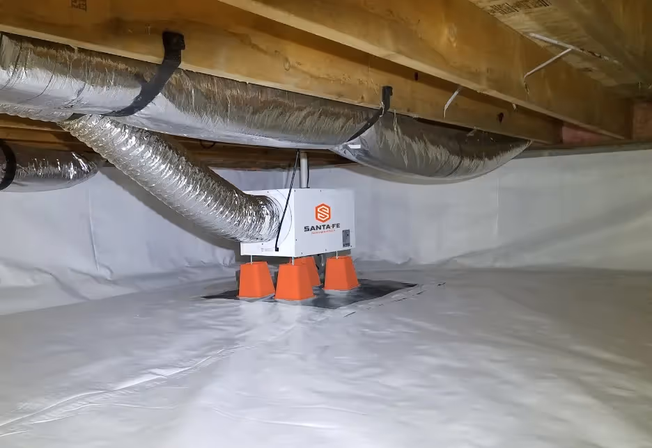 Santa Fe dehumidifier on orange risers.