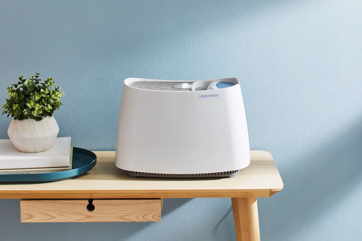 White Honeywell humidifier sitting on table.