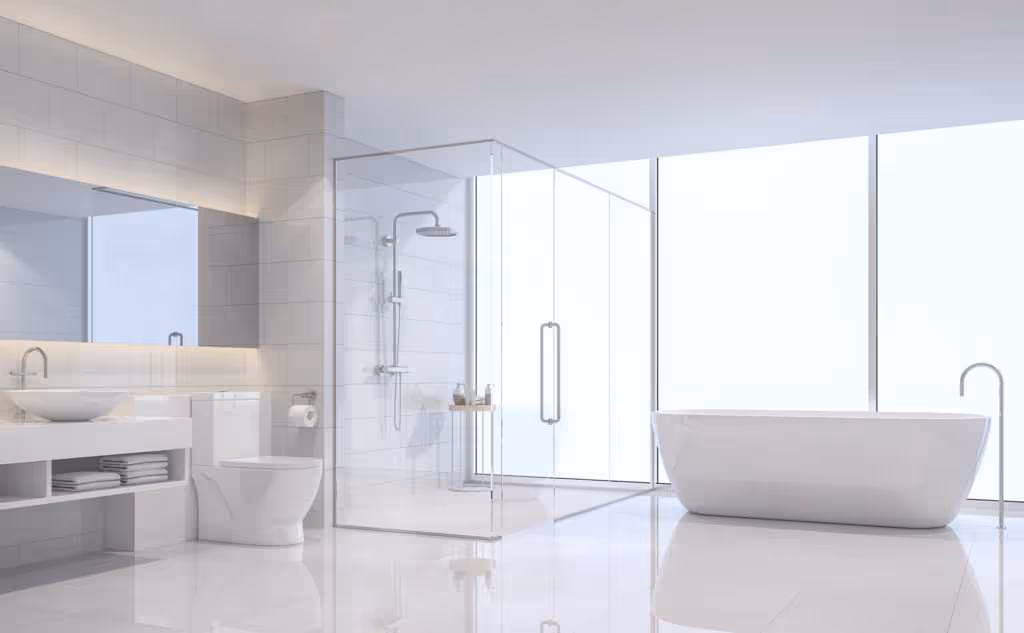 Modern bathroom featuring a glass shower, freestanding bathtub, and sleek fixtures, emphasizing plumbing services like bathroom remodeling and installation by Carter HVAC in Bowling Green, KY.