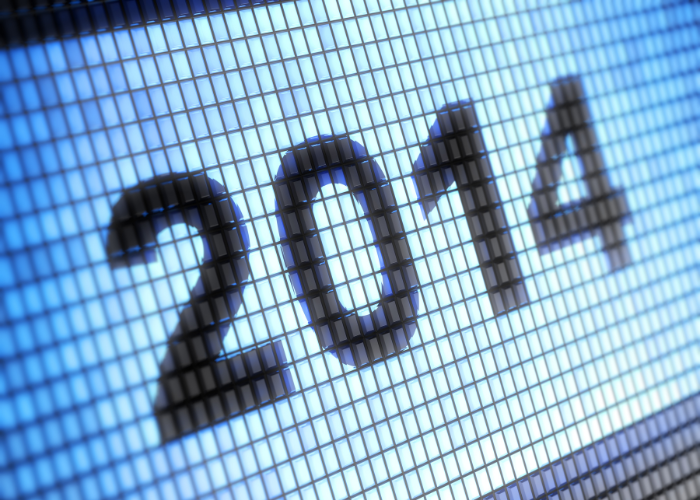 Close-up of a digital display showing the year 2014 in black numbers on a blue grid background.