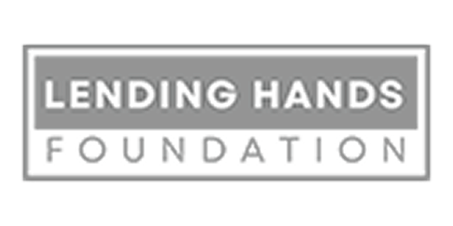 Text logo reading Lending Hands Foundation with Lending Hands in white uppercase letters on a gray background and Foundation below in gray uppercase letters on a transparent background.