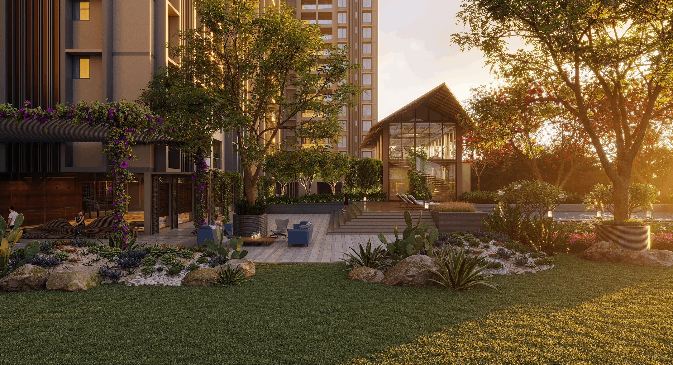 Sunlit modern residential garden with green lawn, trees, succulents, seating area, and a glass pavilion in the background.