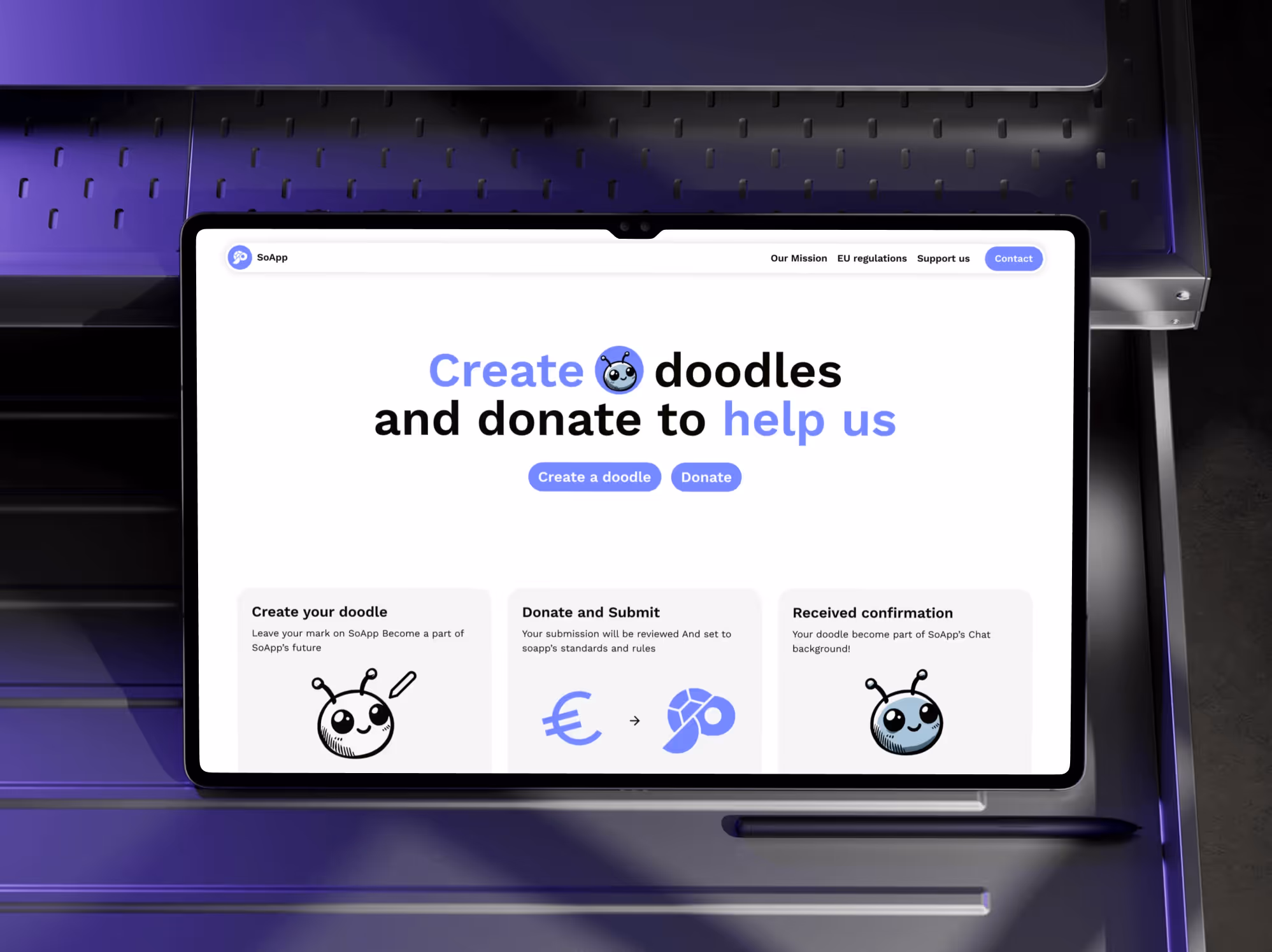 Tablet on a purple desk displaying a website for SoApp with the message: Create doodles and donate to help us, alongside buttons for creating a doodle and donating.