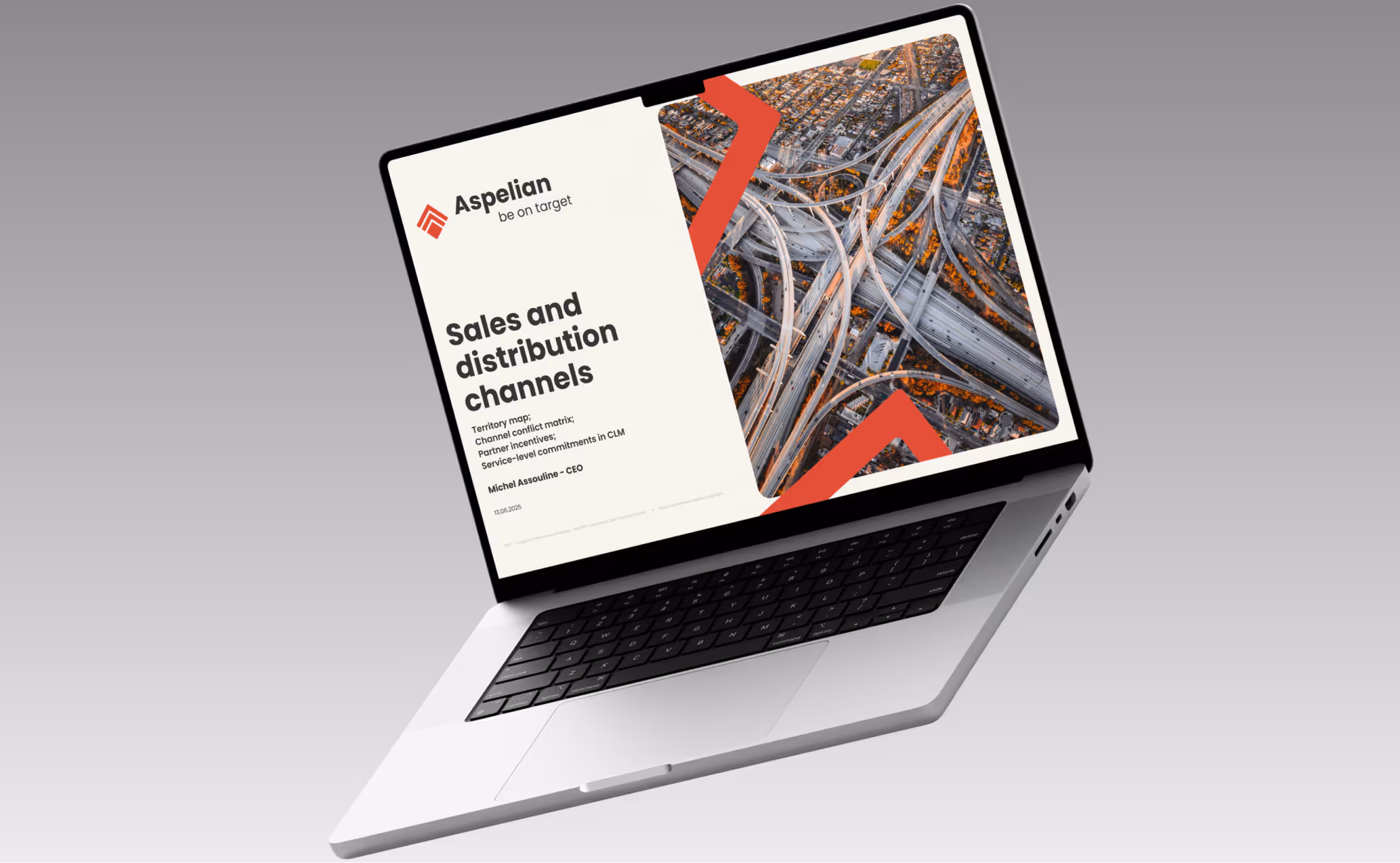 Open laptop displaying a presentation slide titled 'Sales and distribution channels' by Aspelian with an aerial highway interchange image.