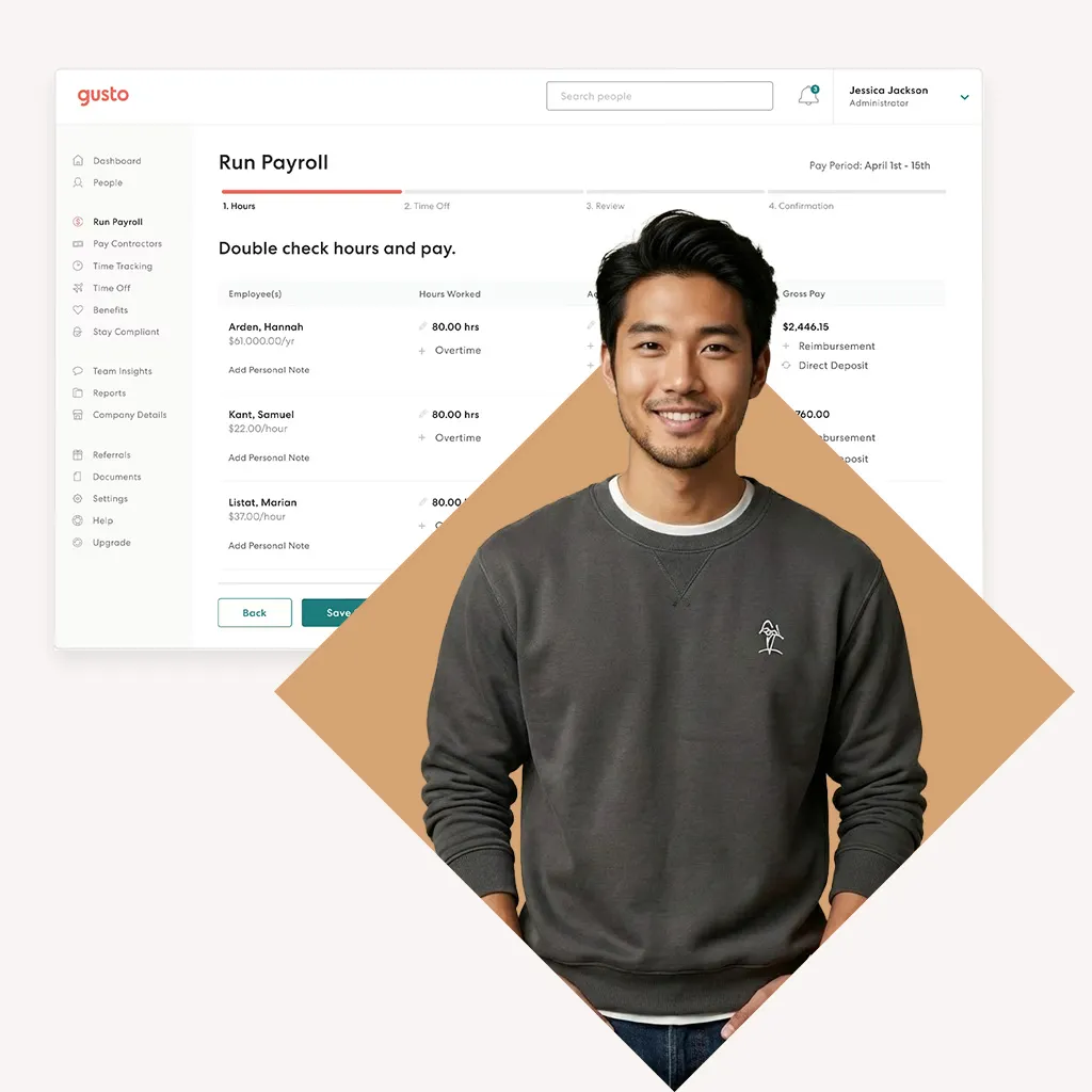 Man in front of a Payroll screenshot