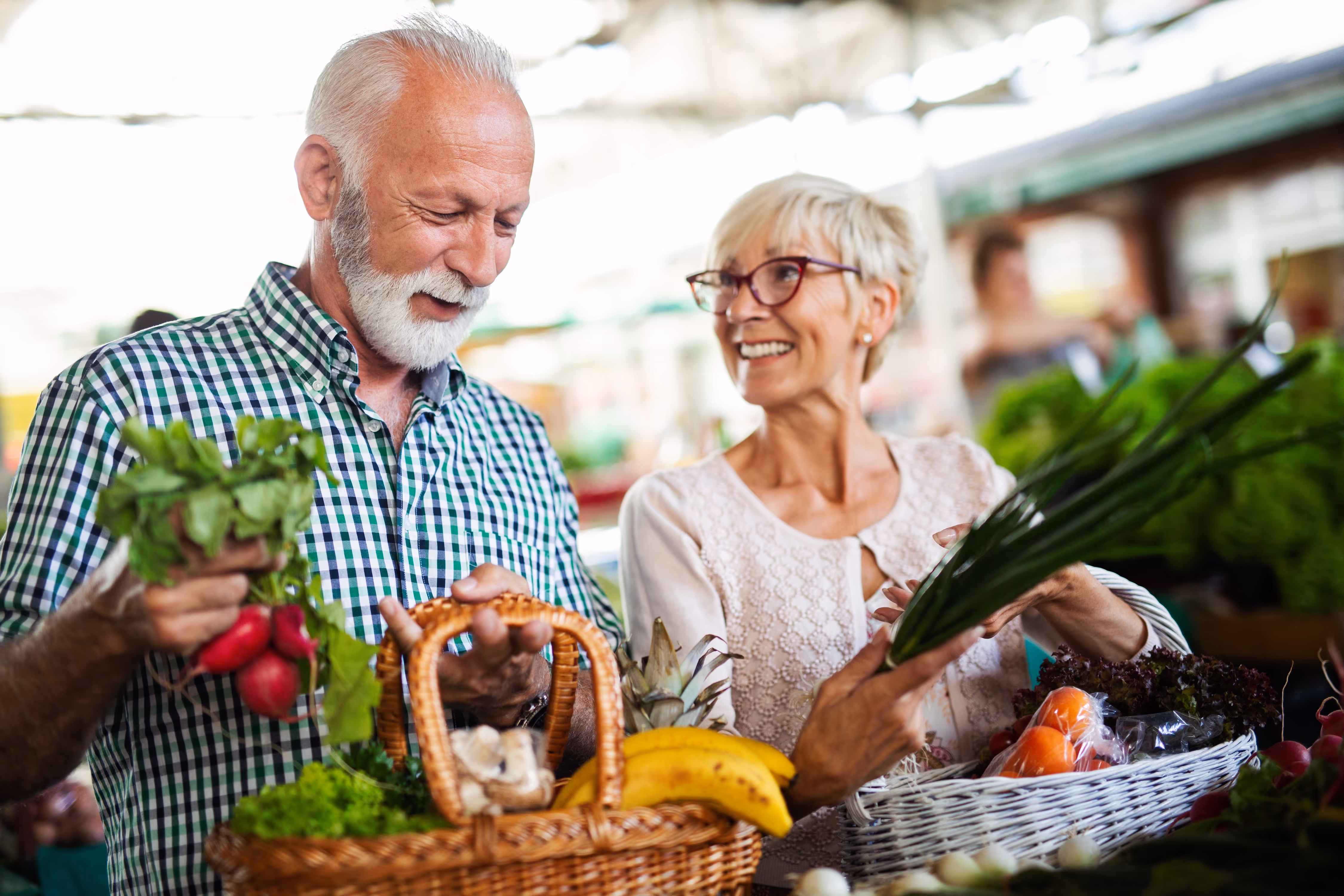 Senior man and woman walking stock photo