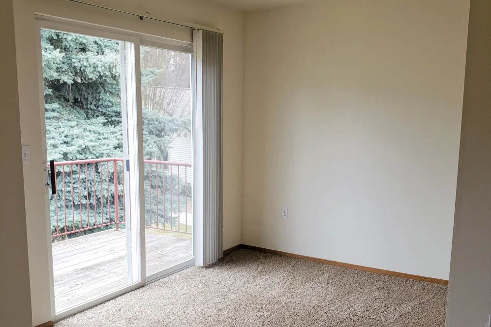 Hallway with brown cabinets
