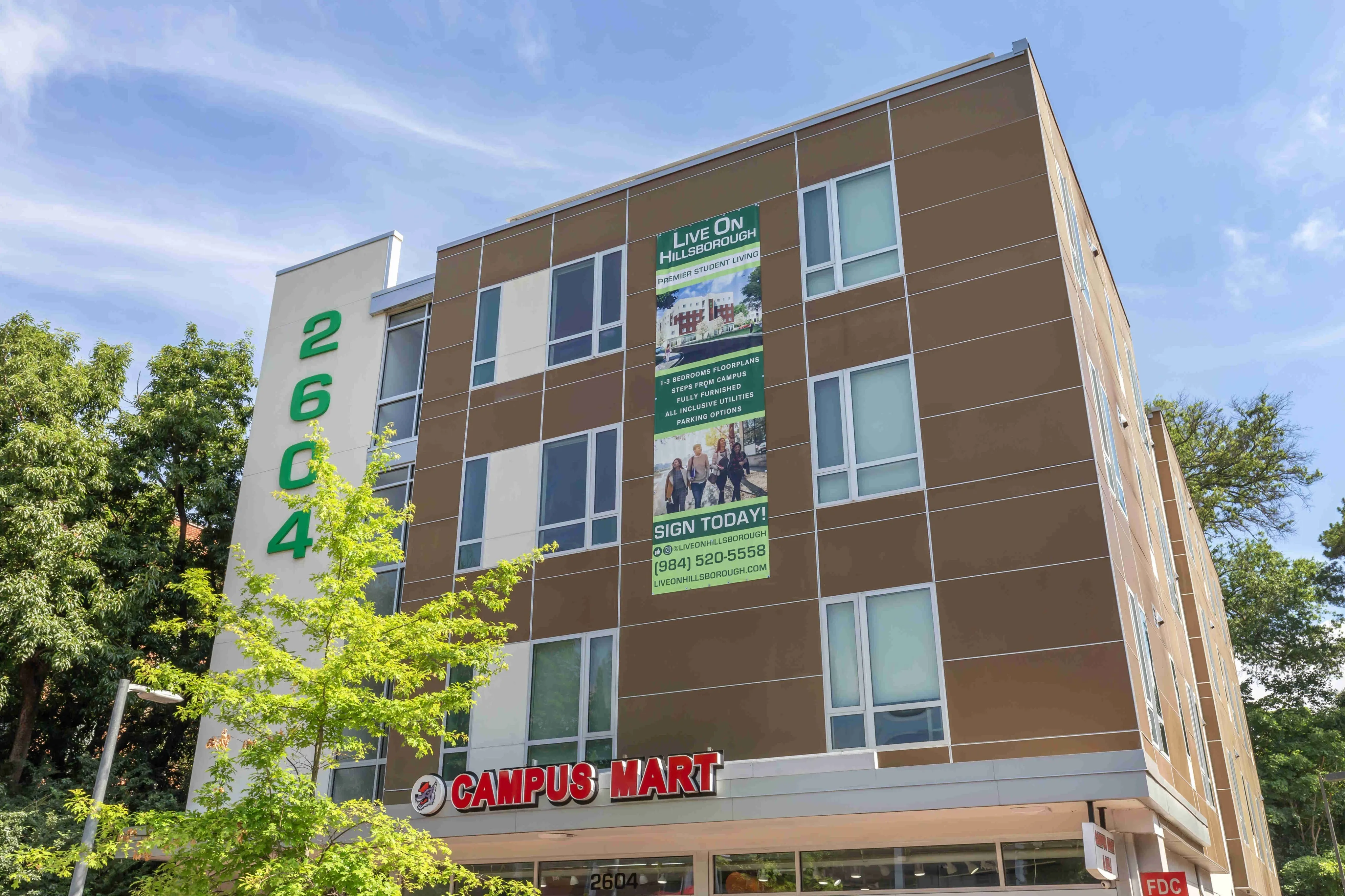 Exterior of apartments with view of Campus Mart
