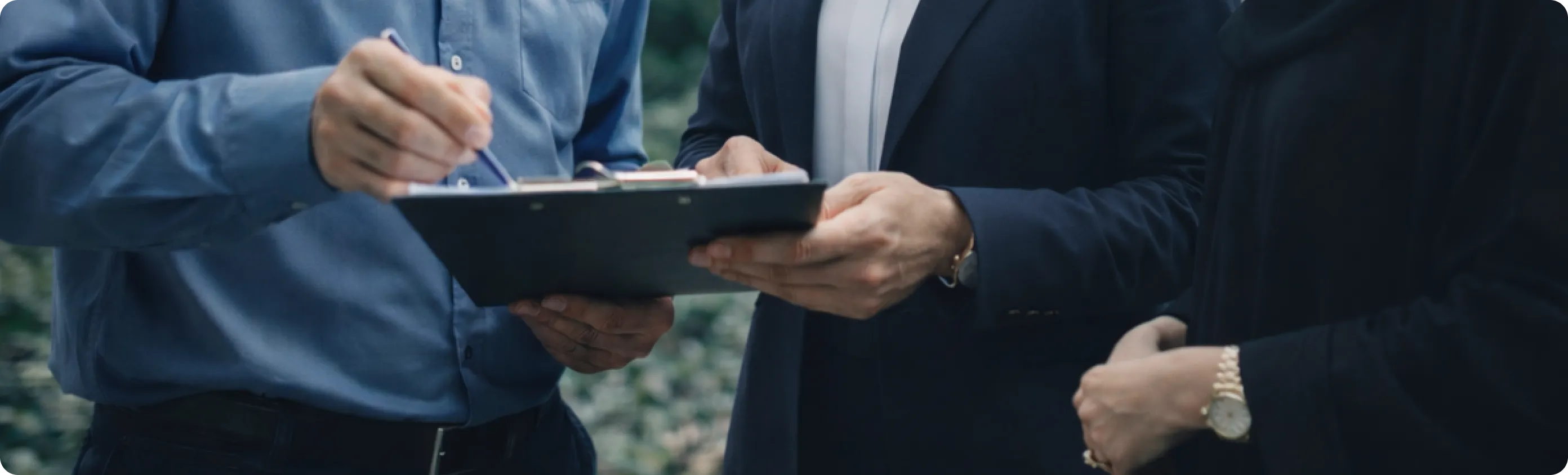 People Signing the Contract