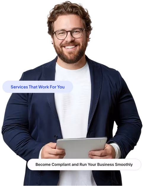 Smiling man with glasses wearing a navy blazer holding a tablet, text bubbles about business services.