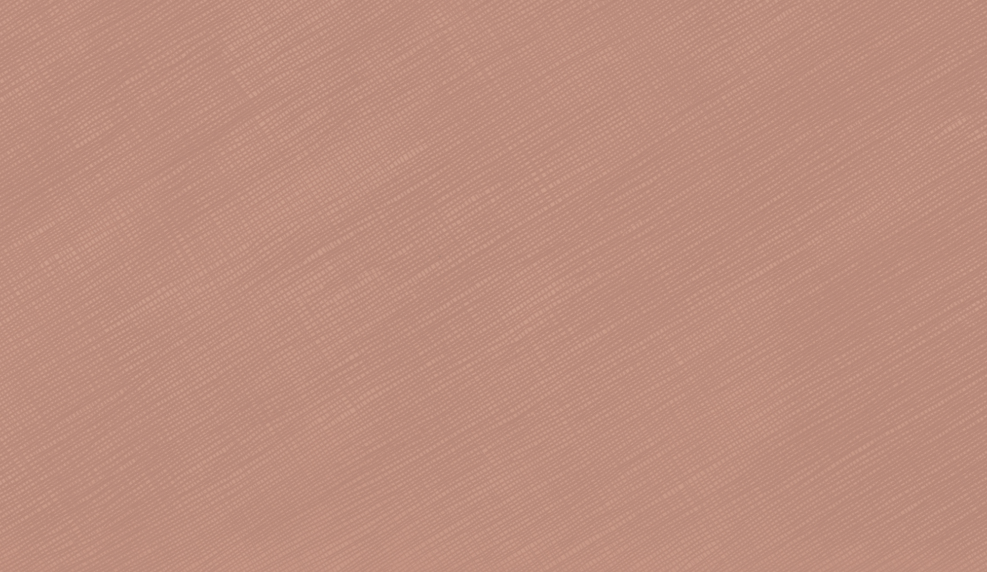 Close-up of a textured peach-colored fabric with fine diagonal weave pattern.