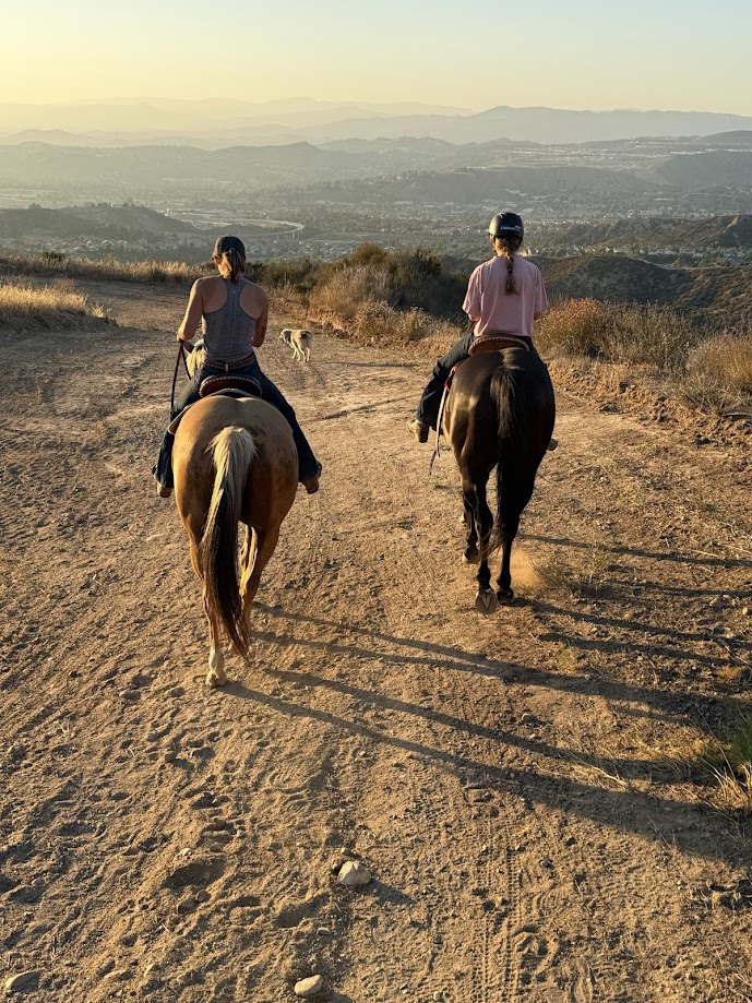 Riders at sunset