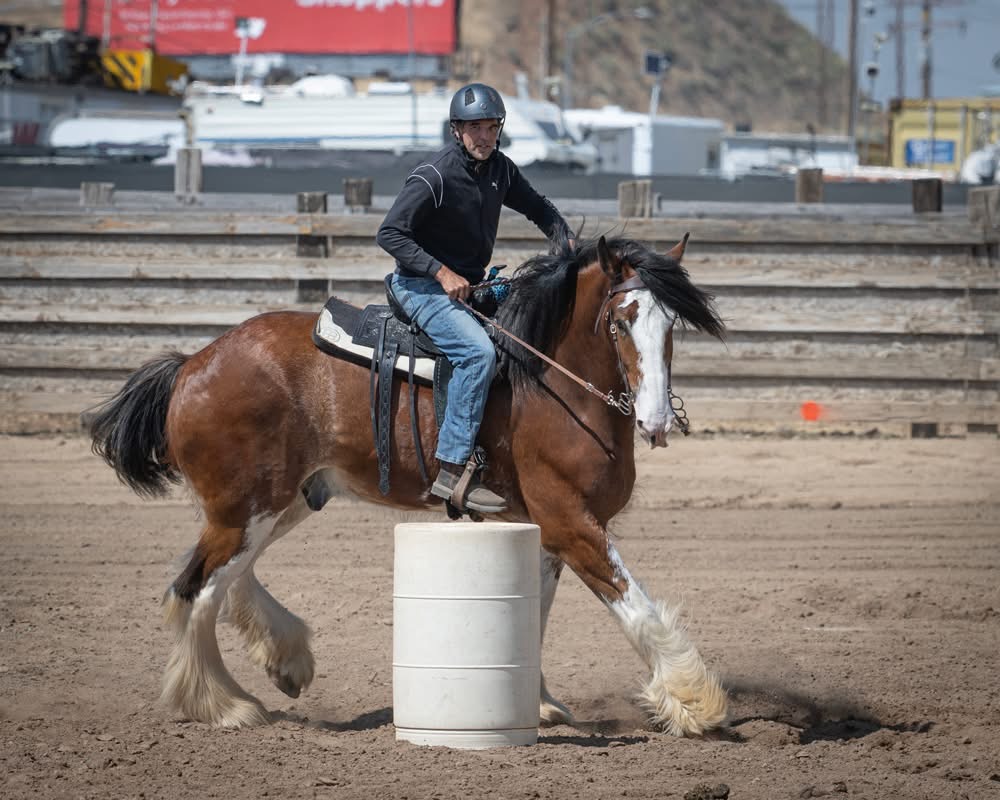 Rider demonstrating proper barrel racing technique