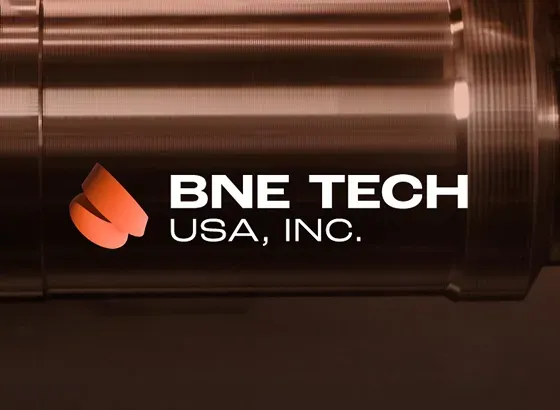 Metal tube with the logo for BNE superimposed in white featuring two orange rings, created by a top branding agency.