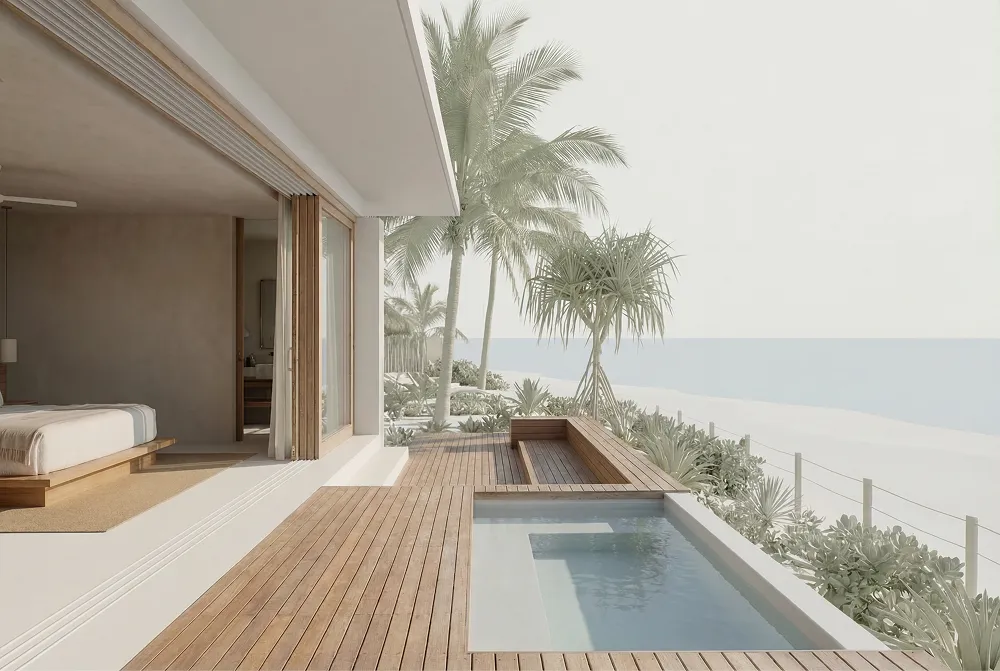 Modern beachfront bedroom with sliding glass doors opening to a wooden deck, small pool, palm trees, and sandy beach ocean view Proof El Salvador.