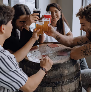 Person wearing a helmet giving a thumbs-up while driving a go-kart number 14.