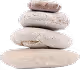 Stack of five smooth white and light-colored stones balanced on top of each other.