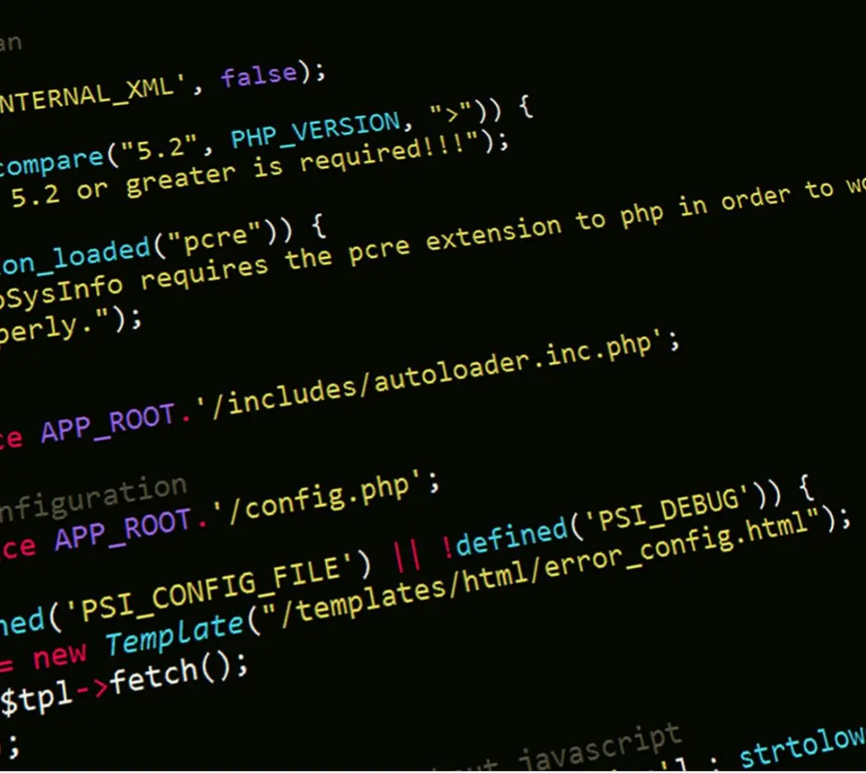 Code PHP coloré affiché sur un écran noir avec des fonctions et des constantes.