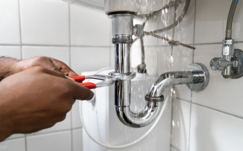 Burst pipe inside a residential home requiring urgent plumbing repair