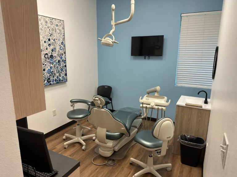image of dental professional working in a dental office