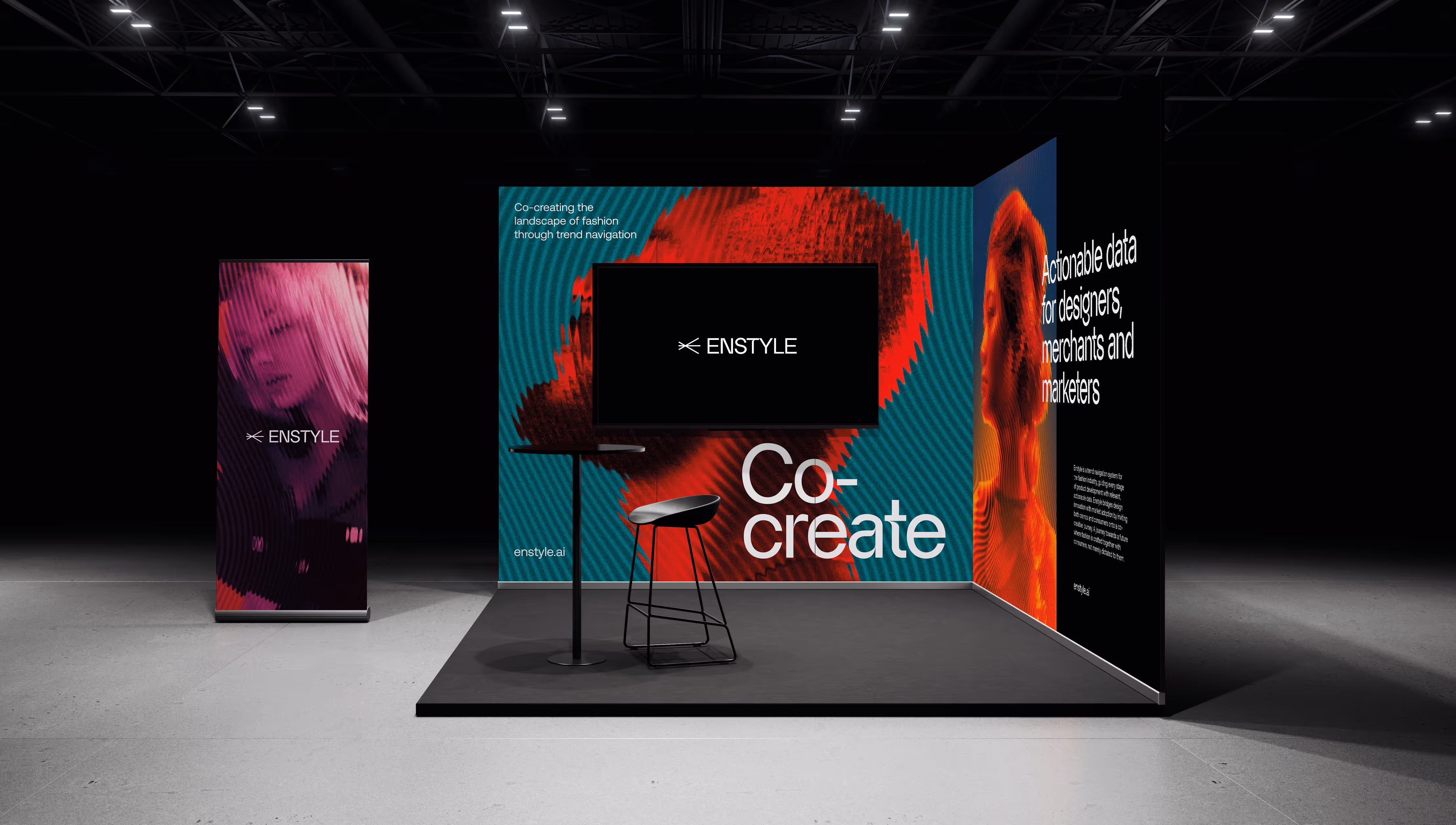 Modern exhibition stand featuring a large screen, a bar stool, and colorful backgrounds with text about fashion trend navigation and actionable data for designers, merchants, and marketers.