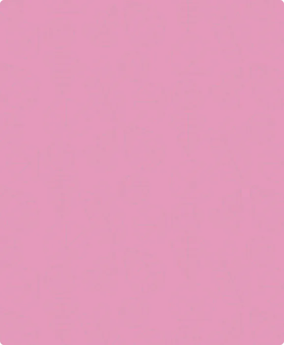 Close-up of a single tall pink dahlia flower in bloom against a blurred green background with a worm on one of the petals.