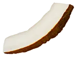 Single slice of coconut showing white flesh and brown husk.