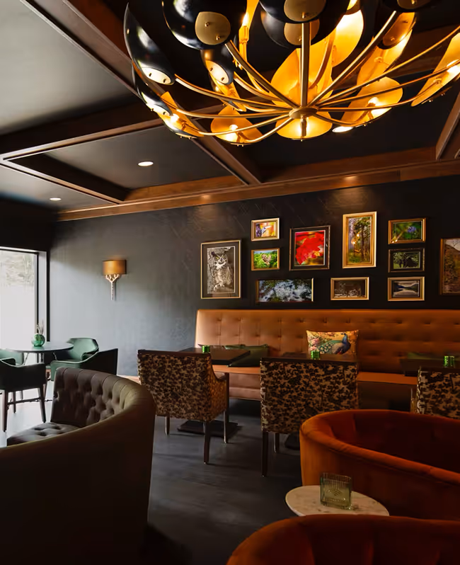 Luxury hotel lobby with high ceilings and modern furniture at The Swift Water hotel.